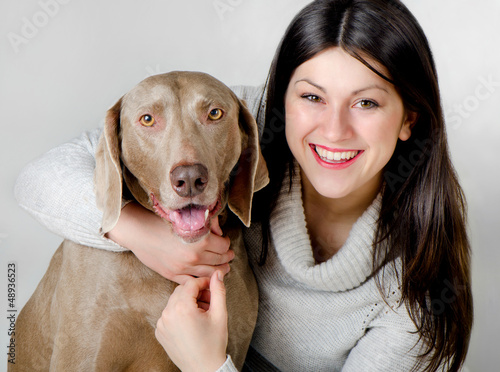 Photo: Young smiling women with dog Young smiling women with dog