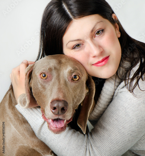 Photo: Young beautiful woman with dog Young beautiful woman with dog
