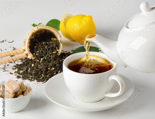 Photo: Tea cup and teapot Tea cup and teapot