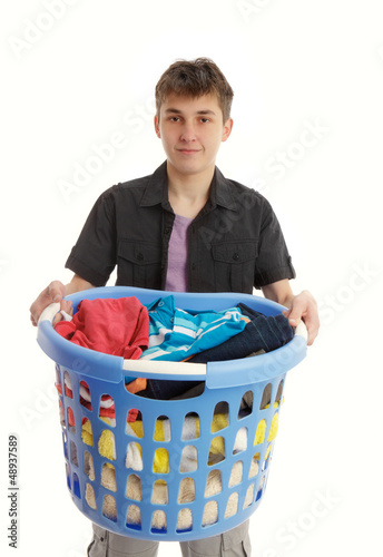 Photo: Teenager with laundry basket Teenager with laundry basket