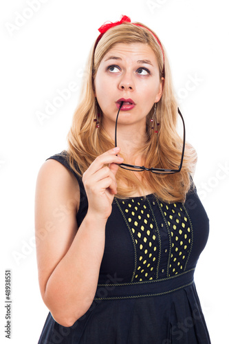 Photo: Pensive woman looking up Pensive woman looking up