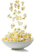 Popcorn falling in a bowl
