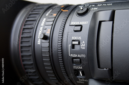 Photo: Close up of professional video camera lens Close up of professional video camera lens
