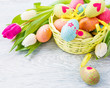 Photo: Easter eggs lying in basket Easter eggs lying in basket