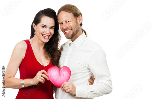Photo: Happy couple holding love heart Happy couple holding love heart