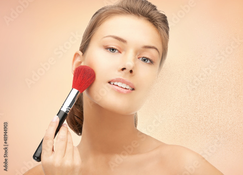 Photo: beautiful woman with brush beautiful woman with brush