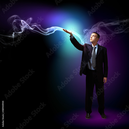 Photo: Businessman with light shining Businessman with light shining