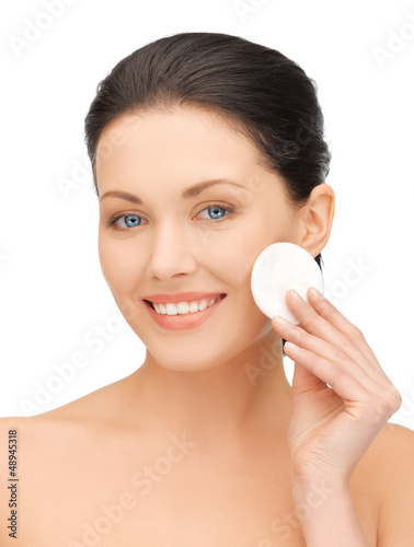 Photo: beautiful woman with cotton pad beautiful woman with cotton pad
