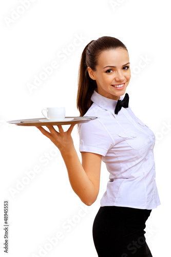 Photo: Young waitress with an empty tray Young waitress with an empty tray