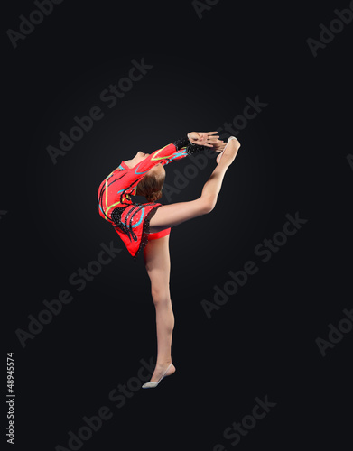 Photo: Young woman in gymnast suit posing Young woman in gymnast suit posing