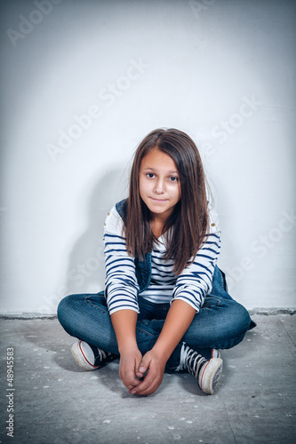 Photo: portrait of a sad teenage girl looking thoughtful about troubles portrait of a sad teenage girl looking thoughtful about troubles