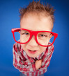 Foto: Funny five years old boy with expressive face, misbehave concept Funny five years old boy with expressive face, misbehave concept
