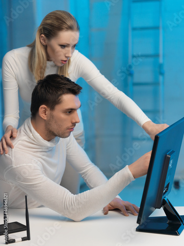 Photo: man and woman in laboratory man and woman in laboratory