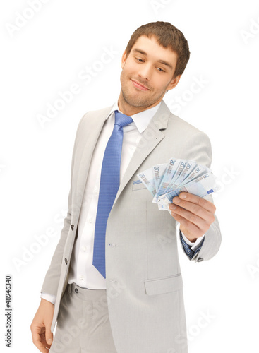 Photo: man with euro cash money man with euro cash money