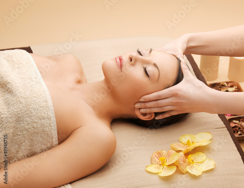 Photo: beautiful woman in massage salon beautiful woman in massage salon