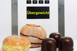 Pfannkuchen, Schokoküsse und Waage