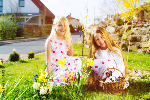 Photo: Children on Easter egg hunt with bunny Children on Easter egg hunt with bunny