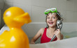 happy little girl have a bath