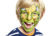 Young boy with face painting monster
