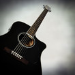 black acoustic guitar