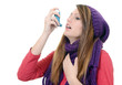 Photo: Woman with asthma using an asthma inhaler Woman with asthma using an asthma inhaler