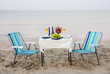 romantic dinner on the sea beach with candles and wine