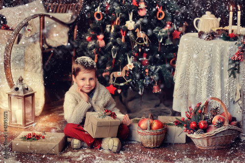 Photo: sitting on the floor of a handsome boy with gifts and baskets at sitting on the floor of a handsome boy with gifts and baskets at