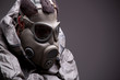 Man in protective mask on gray background