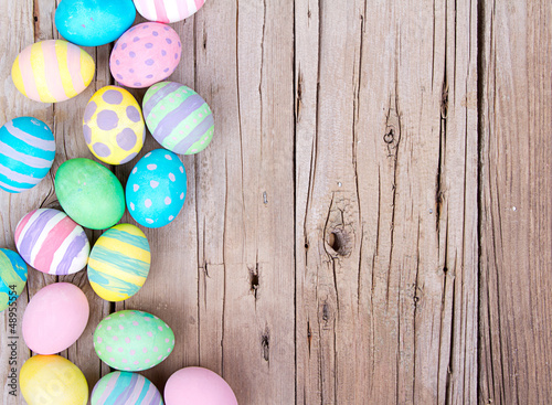 Photo: Easter eggs on a wooden background Easter eggs on a wooden background