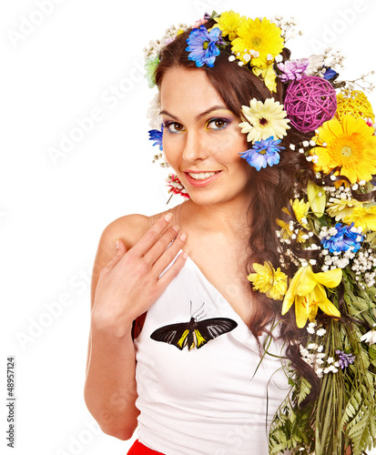 Photo: Woman with flower and butterfly. Woman with flower and butterfly.