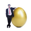 Businessman and golden egg