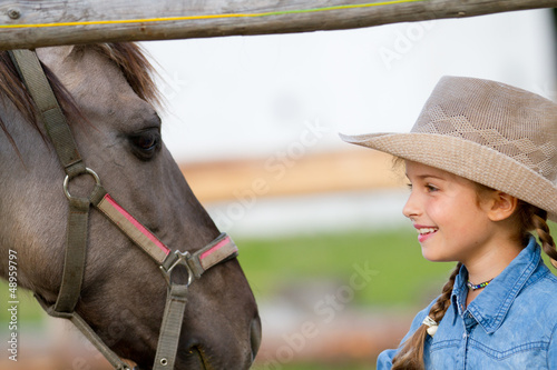 Photo: Ranch - girl with horse on the ranch, horse whisperer Ranch - girl with horse on the ranch, horse whisperer