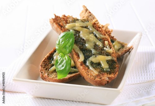 Photo: Toasted pesto bread with cheese Toasted pesto bread with cheese