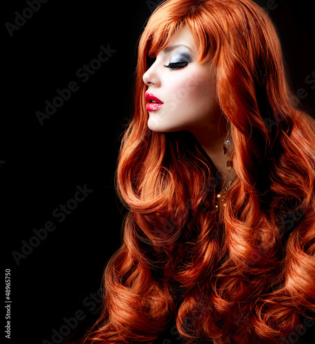 Photo: Wavy Red Hair. Fashion Girl Portrait Wavy Red Hair. Fashion Girl Portrait
