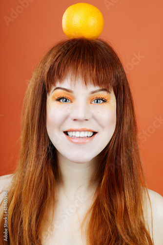 Photo: girl with orange girl with orange