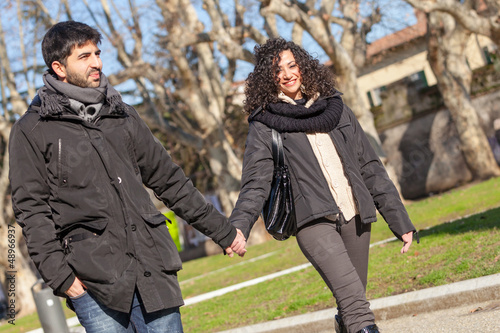 Photo: Romatic Young Couple Walking in the City Romatic Young Couple Walking in the City