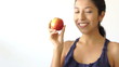 Young girl holding an apple
