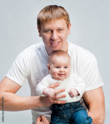 Photo: Father with babies Father with babies