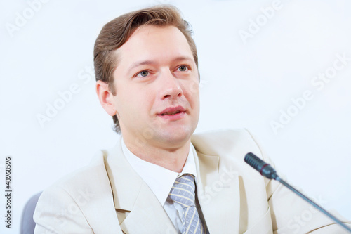 Photo: Businessman at meeting Businessman at meeting