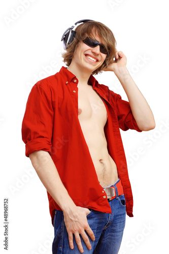 Photo: Happy smiling young man dancing Happy smiling young man dancing