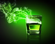 Glass of green absinth