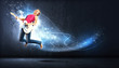 Photo: young woman playing on electro guitar and jumping young woman playing on electro guitar and jumping