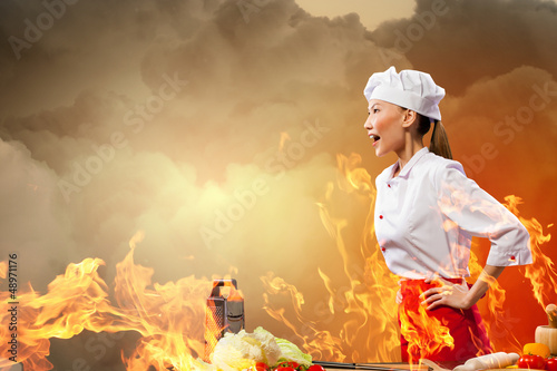 Photo: Asian female cook in anger Asian female cook in anger