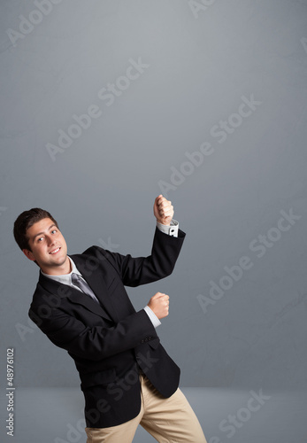 Photo: Young man gesturing with copy space Young man gesturing with copy space