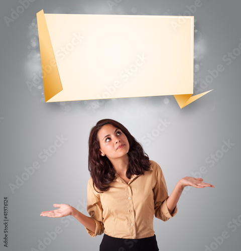 Photo: attractive woman lookint modern origami copy space attractive woman lookint modern origami copy space