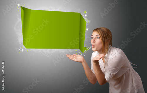 Photo: Young woman with modern speech bubble Young woman with modern speech bubble