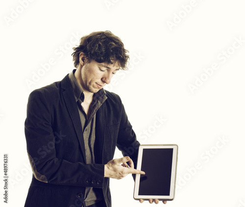 Photo: Young Businessman with tablet Young Businessman with tablet