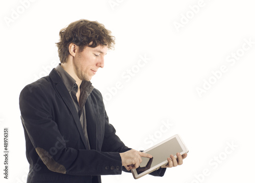 Photo: Young Businessman with tablet Young Businessman with tablet