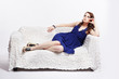Photo: woman relaxing on sofa woman relaxing on sofa