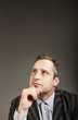 portrait of adult man isolated on dark background
